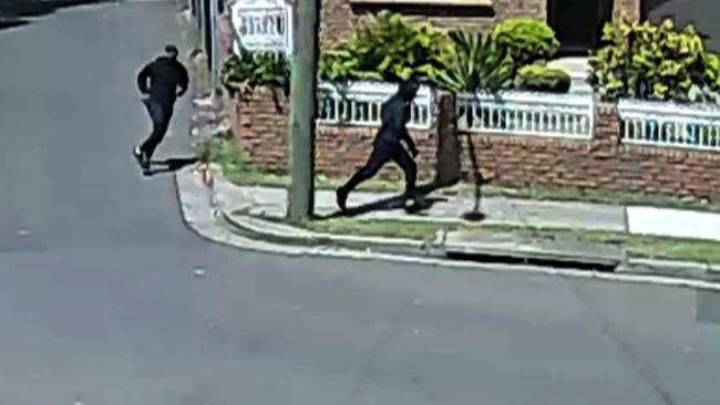 A CCTV still of two men suspected of being the shooters of Mahmoud ‘Mick’ Hawi running from the Rockdale shooting scene. Supplied by NSW Police