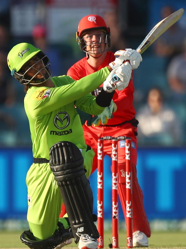 Ollie Davies playing for Thunder bats against the Melbourne Renegades.