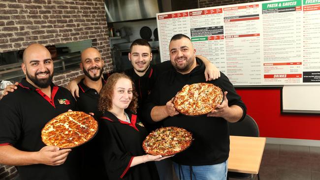 Anthony Saad, Peter Gergis, Breanna Cardona, Jordan Boudoloh and Elias Bouldoloh at Get Sliced Pizzeria, Melton. Picture: Hamish Blair