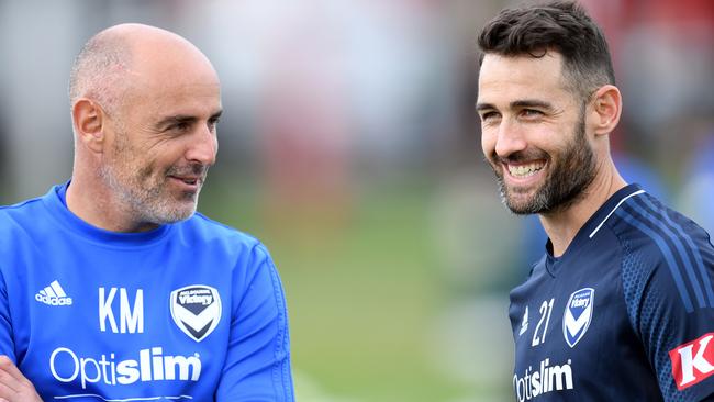 Victory coach Kevin Muscat, left, with his side’s captain Carl Valeri at training at Gosch’s Paddock on Thursday. Picture: AAP