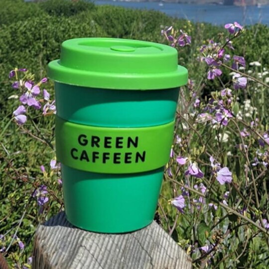 Bright “Green Caffeen” Keep Cups.