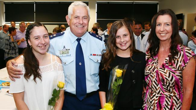 Superintendent Dave Swilks with his wife Trish and daughters Bethanee and Hannah, during his farewell at Wyong police station. Picture: Peter Clark