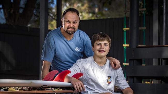 Steven Bradbury also pictured with his 13-year-old son Flyn who was involved with the rescue. Picture: Nigel Hallett