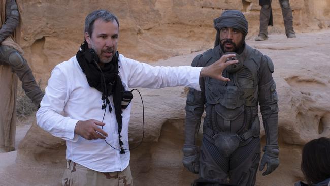 Denis Villeneuve on the Dune set with Javier Bardem. Picture: Warner Bros