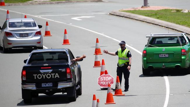 Police checking drivers coming into Queensland from NSW on the Gold Coast Highway in Coolangatta. Picture: Nigel Hallett