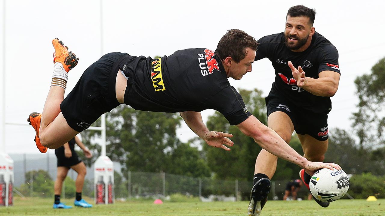 Dylan Edwards dives for a try during Penrith NRL training at Panthers Rugby League Academy, Penrith. Picture: Brett Costello