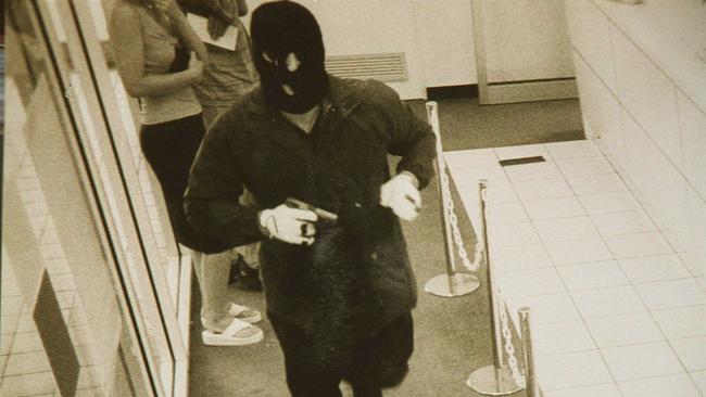 An armed robber at the Bank of Queensland at Sunnybank Plaza in December 2000.