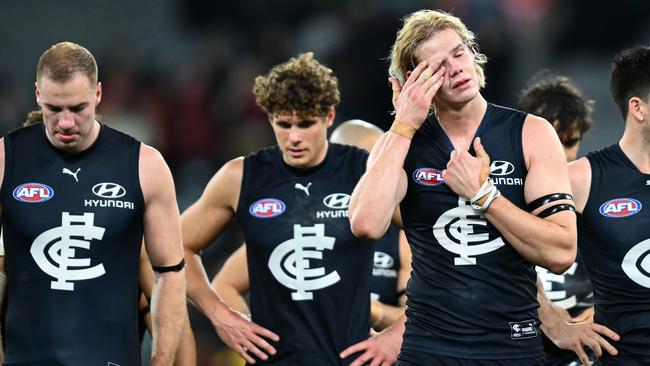 MELBOURNE, AUSTRALIA – JUNE 11: The Blues look dejected after losing the round 13 AFL match between Carlton Blues and Essendon Bombers at Melbourne Cricket Ground, on June 11, 2023, in Melbourne, Australia. (Photo by Quinn Rooney/Getty Images)