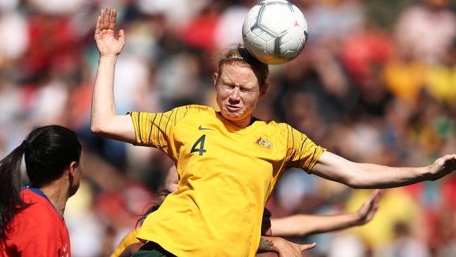 Clare Polkinghorne heads the ball for the Matildas against Chile on Saturday. Picture: Getty Images