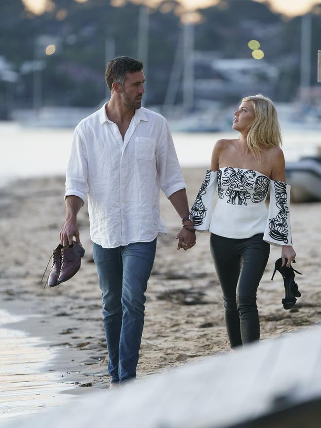 Days later she was spotted walking along the beach with a tall, handsome bachelor.