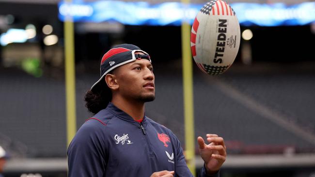 LAS VEGAS, NEVADA - MARCH 01: Sitili Tupouniua of the Sydney Roosters tosses the ball during a Sydney Roosters NRL Captain's Run at Allegiant Stadium, on March 01, 2024, in Las Vegas, Nevada.   Ezra Shaw/Getty Images/AFP (Photo by EZRA SHAW / GETTY IMAGES NORTH AMERICA / Getty Images via AFP)