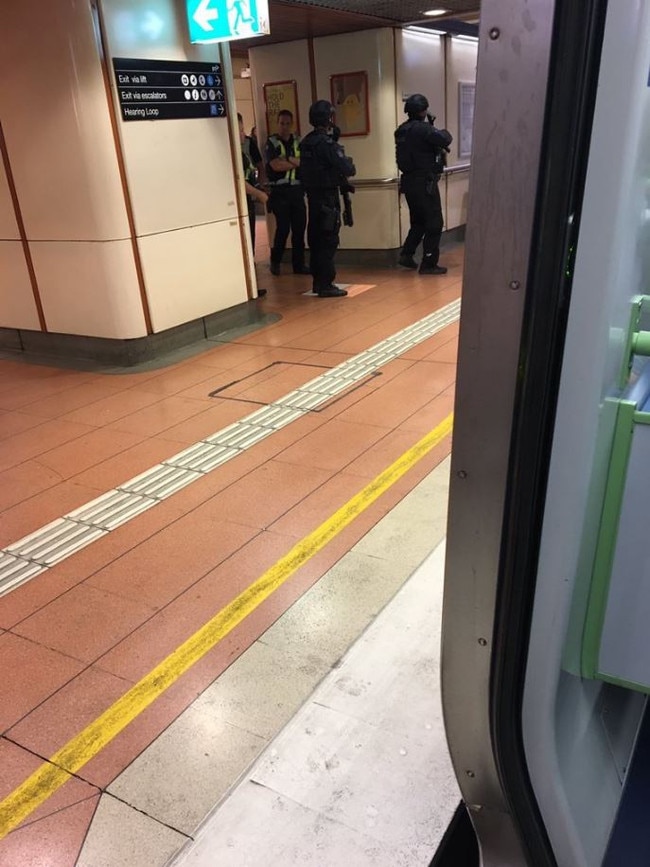 Police at Flagstaff station this morning. Picture: Twitter/sahuddo/Scott Hudson