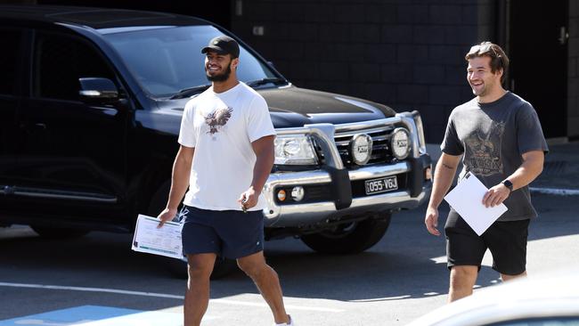 Payne Haas and Patrick Carrigan keep their distance as they leave a team meeting in Brisbane. Picture: AAP.