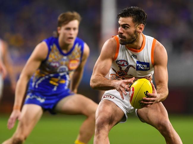 PERTH, AUSTRALIA - AUGUST 23: Stephen Coniglio of the Giants looks at his options during the 2020 AFL Round 13 match between the West Coast Eagles and the GWS Giants at Optus Stadium on August 23, 2020 in Perth, Australia. (Photo by Daniel Carson/AFL Photos via Getty Images)