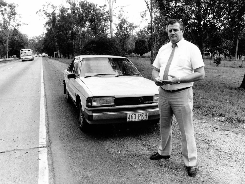 Detective Sgt Ken Foreman stands beside Sharron Phillips' car on Ipswich Rd, Wacol.