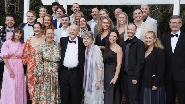 THE FAMILY: Dr Stan Green and wife Pam surrounded by their children and partners, and their 11 grandchildren.