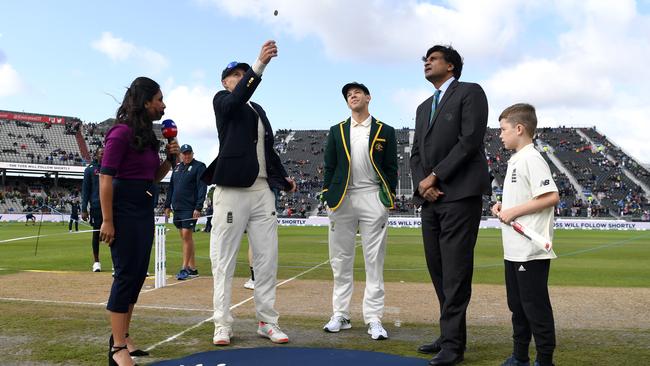 England captain Joe Root and Australia captain Tim Paine at the toss. Picture: Getty Images