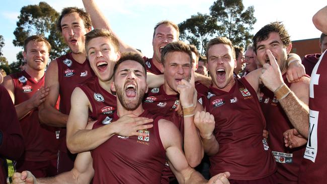 Prince Alfred Old Collegians players celebrate after their win over Tea Tree Gully in the Division One Amateur League Football Grand Final at Thebarton Oval. Picture: Stephen Laffer