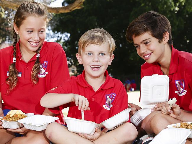 **Embargoed for The Saturday Telegraph.**Wulan Yuliantara, 9, Michayla Penn, 11, Tom Howatson, 6, Lenny Miller, 11, and Bailey Gosbell, 9, eating healthy lunches supplied by local cafe Barzura, at Coogee Public School today.Picture: Justin Lloyd.