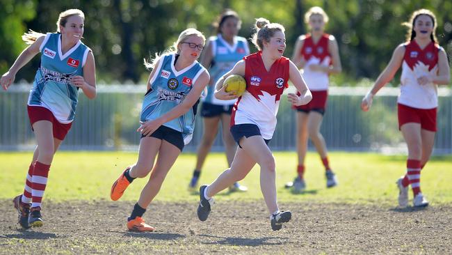 Mosman Swans and Drummoyne AFL players at Middle Head Oval.