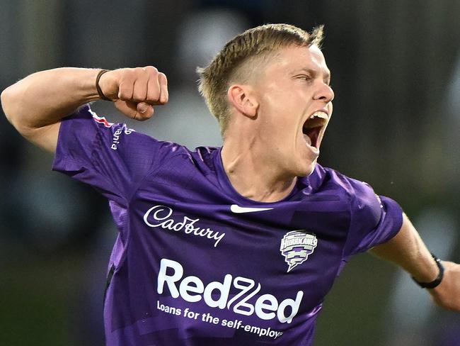 HOBART, AUSTRALIA - JANUARY 23: Nathan Ellis of the Hurricanes celebrates the wicket of Steve Smith of the Sixers during the Men's Big Bash League match between the Hobart Hurricanes and the Sydney Sixers at Blundstone Arena, on January 23, 2023, in Hobart, Australia. (Photo by Steve Bell/Getty Images)