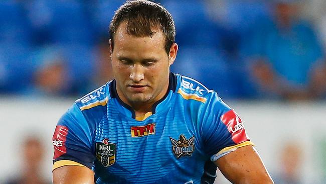 GOLD COAST, AUSTRALIA - MARCH 19:Tyrone Roberts of the Titans kicks the ball during the round three NRL match between the Gold Coast Titans and the Wests Tigers at Cbus Super Stadium on March 19, 2016 in Gold Coast, Australia. (Photo by Jason O'Brien/Getty Images)