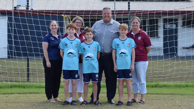 MA Olympic FC members Justine Williams, Lewis Williams, Amanda Nass, Eamon Williams, Kaidan Nass and Sheena King with Dawson MP Andrew Willcox.