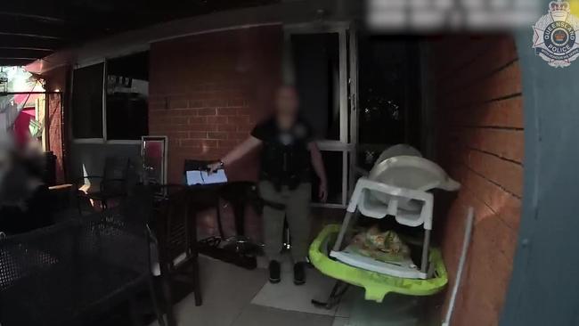 A baby walker inside one of the raided properties where it is alleged drugs were found.