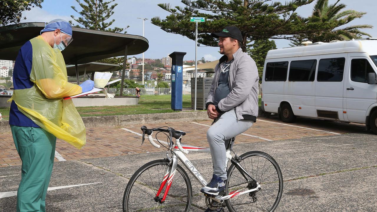 Drive through, or rather cycle through, testing in Bondi, and Australian hot spot for COVID-19. e Picture: Matrix.