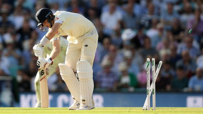 Joe Root is bowled by Pat Cummins. Picture: Getty Images