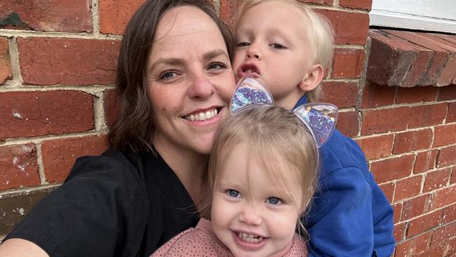 Former RDH worker Emily Bannister, with children Rune and Dolly, is one of thousands forced to wait months for back-pay owed by the Northern Territory government. Picture: Supplied.