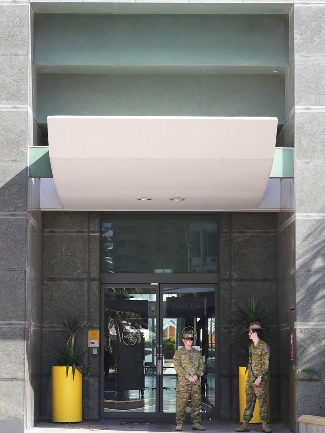 The Army rolled into Surfers Paradise to stand guard outside the Voco Hotel, where passengers from overseas are in quarantine. Picture Glenn Hampson.