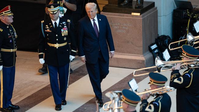 US President Donald Trump reviews the troops in Emancipation Hall during inauguration ceremonies at the US Capitol in Washington on January 20. Picture: AFP