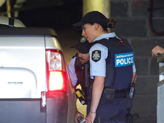 SYDNEY, AUSTRALIA - NewsWire Photos - NOVEMBER 18 2020: AFP seen checking a car as it enters the carpark of the CFMEU offices during a Police Raid in Pyrmont, Sydney Australia. Picture:  NCA NewsWire / Gaye Gerard