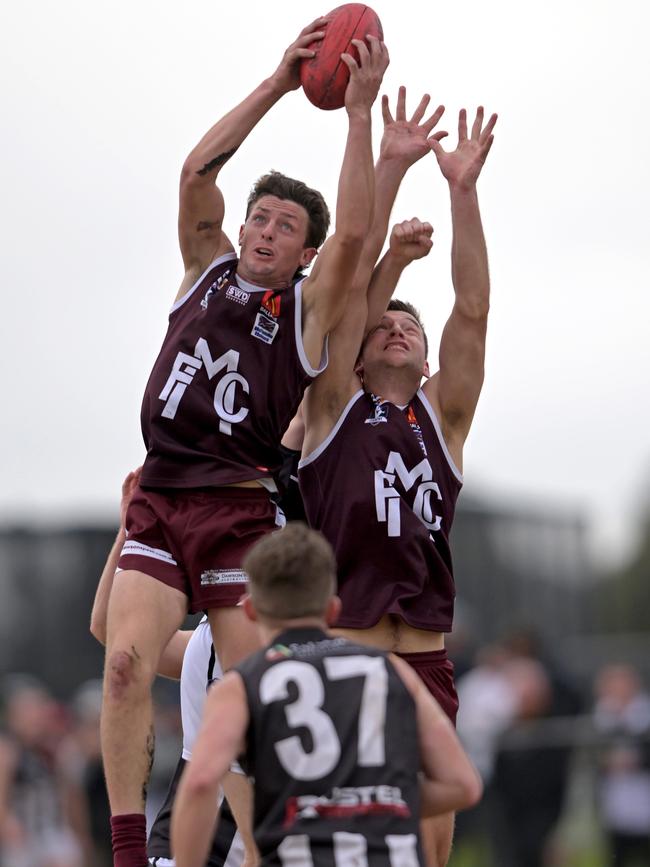 Melton’s Harrison Hanley takes a strong grab. Picture: Andy Brownbill