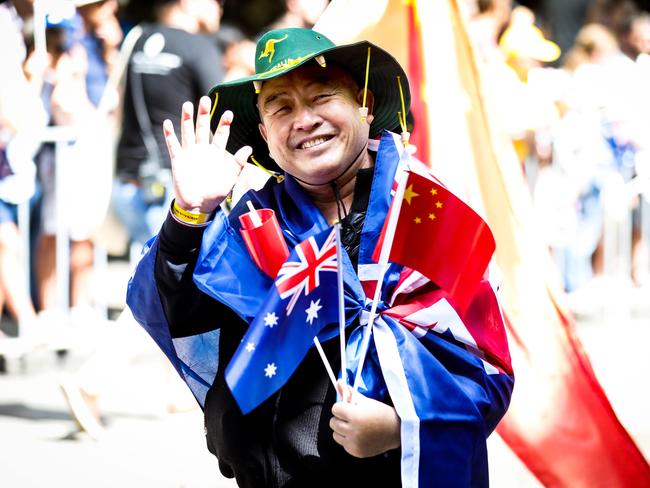 Members from the Chinese Community embracing the corked hat on Australia Day. Picture: Nicole Cleary