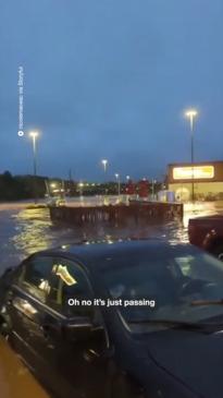 Floods sweep entire patio across Canadian carpark