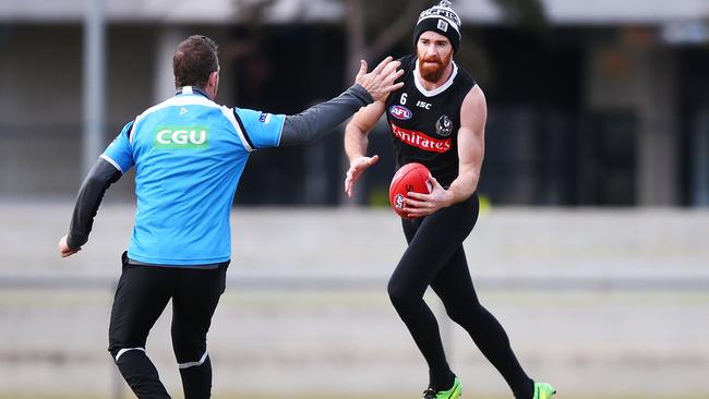 Tyson Goldsack tests his knee out during a training session last year. Picture: Michael Dodge/Getty Images. 