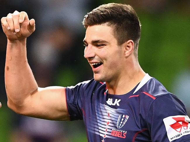 MELBOURNE, AUSTRALIA - MARCH 09:  Jack Maddocks of the Rebels is congratulated by Will Genia after scoring a try during the round four Super Rugby match between the Rebels and the Brumbies at AAMI Park on March 9, 2018 in Melbourne, Australia.  (Photo by Quinn Rooney/Getty Images)