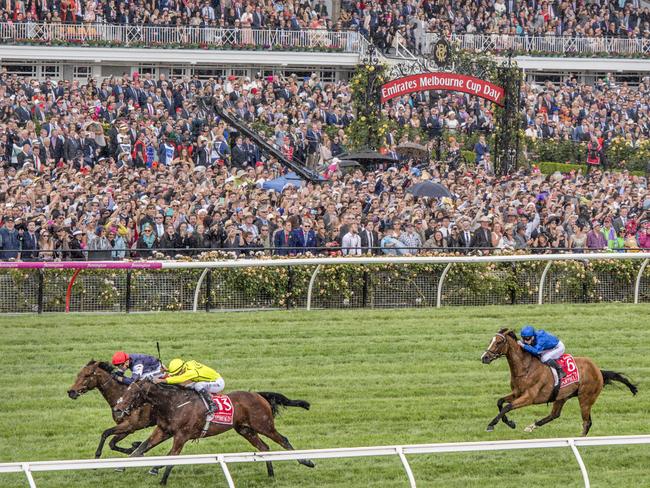 Thousands watched on from Flemington as Almandin and Heartbreak City went toe-to-toe for the Melbourne Cup. Picture: Jason Edwards