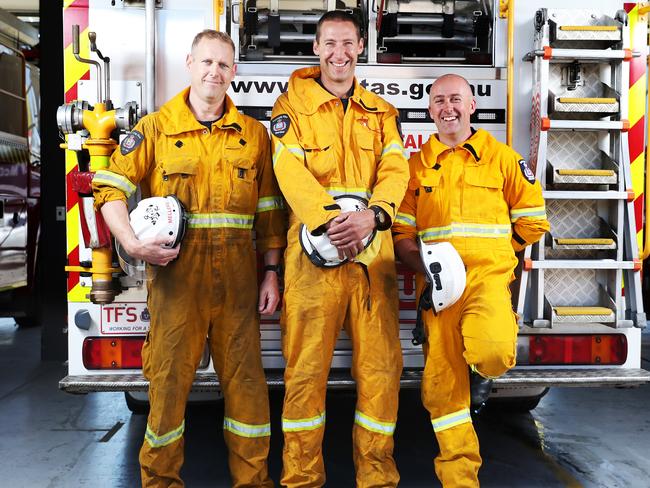 Senior firefighters, from left, Luke Mellers, Darren McGinniss and Jeremy Hughes, who are all remote area firefighters based in Hobart, are prepared for the upcoming bad fire weather st to hit Tasmania. Picture: NIKKI DAVIS-JONES