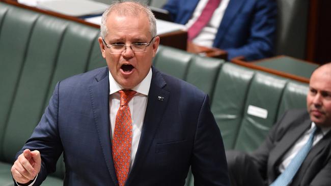 Prime Minister Scott Morrison says Queensland’s border closure is “holding back jobs”. Picture: Mick Tsikas