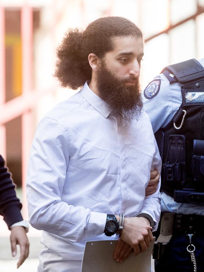 Abdullah Chaarani laughed and chatted with his co-accused between verdicts. Picture: Jake Nowakowski