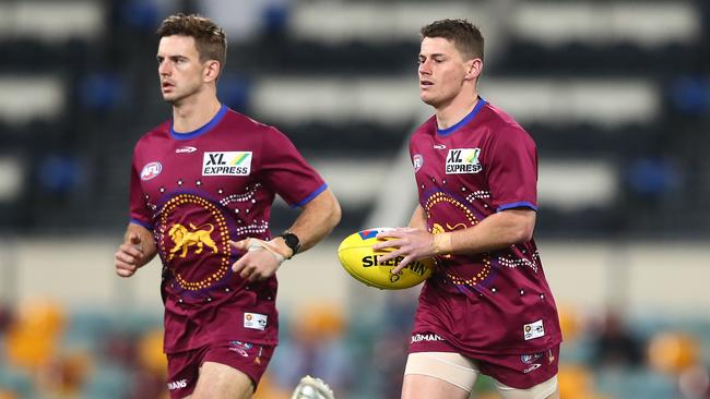 Dayne Zorko, right, scored 174 points against the Cats. Picture: Chris Hyde/AFL Photos