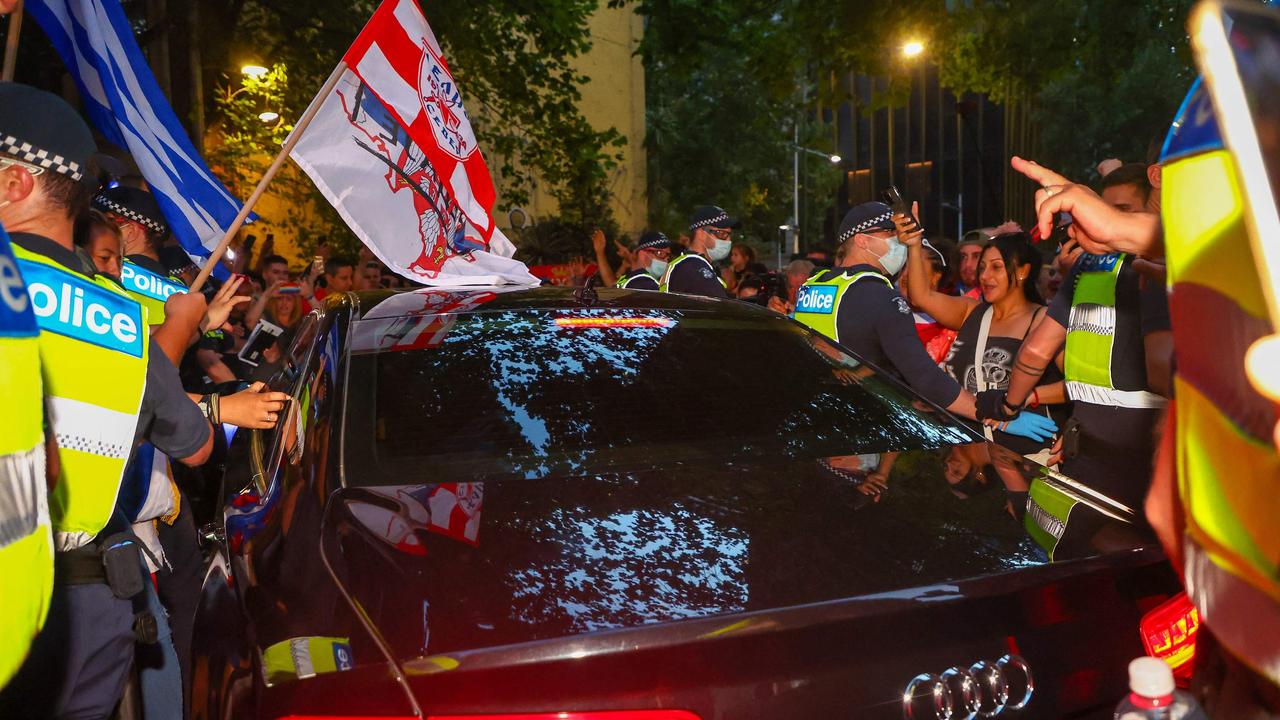 The streets of Melbourne’s CBD descended into chaos outside the offices of the lawyer who represented the world No.1. Picture: AFP