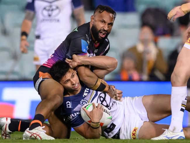 SYDNEY, AUSTRALIA - AUGUST 01: Justin Olam of the Tigers tackles Heilum Luki of the Cowboys during the round 22 NRL match between Wests Tigers and North Queensland Cowboys at Leichhardt Oval, on August 01, 2024, in Sydney, Australia. (Photo by James Gourley/Getty Images)