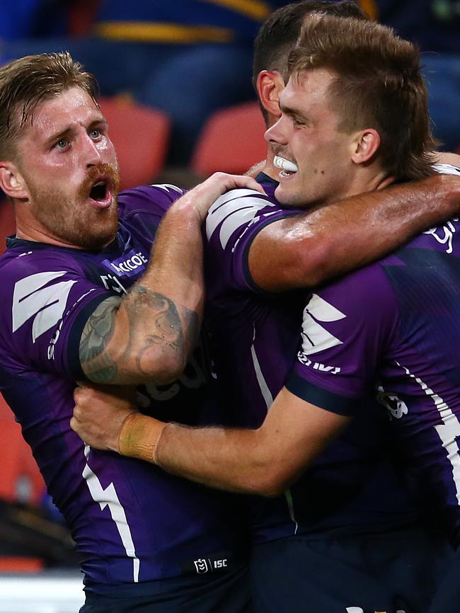 Cameron Munster and Ryan Papenhuyzen celebrate a try in Melbourne Storm’s finals win over Parramatta Eels.