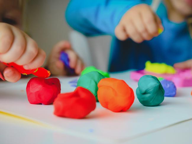 kids play with clay molding shapes, learning through play concept