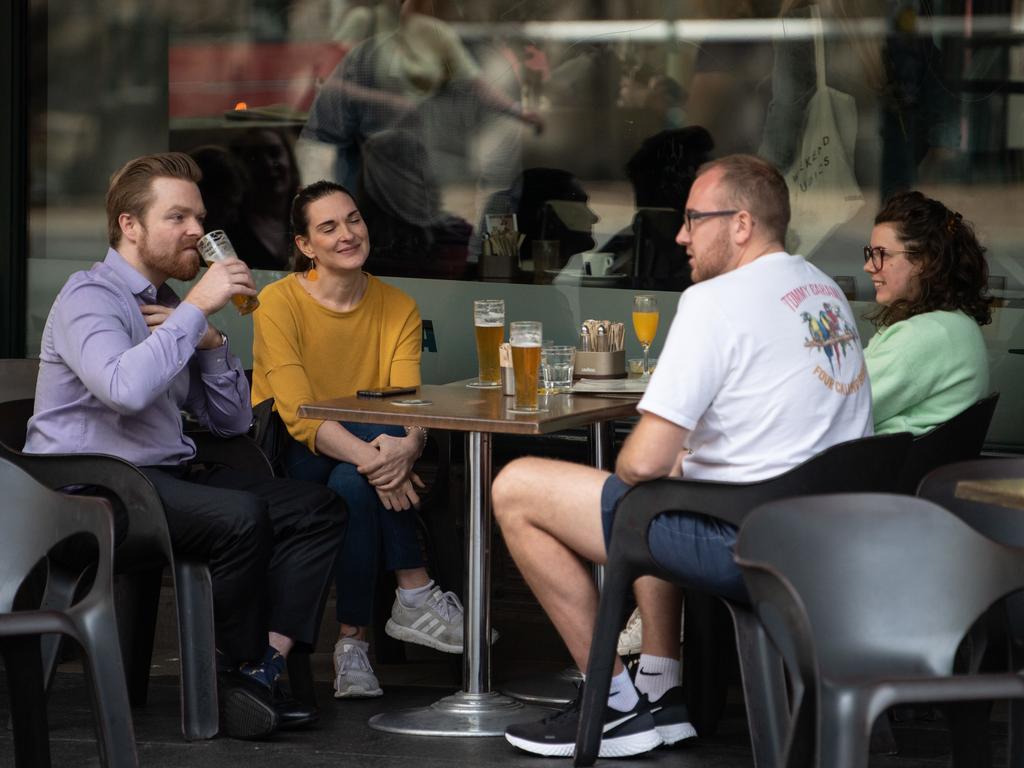 People are seen at a restaurant ahead of the nationwide shut down of cafes, restaurant and licensed venues. Picture: James Gourley/AAP