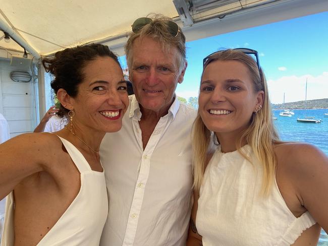 Steve Wilton, 63, of Manly, with wife Caroline Chavez, left and daughter Bella, before he was diagnosed with Motor Neurone Disease.